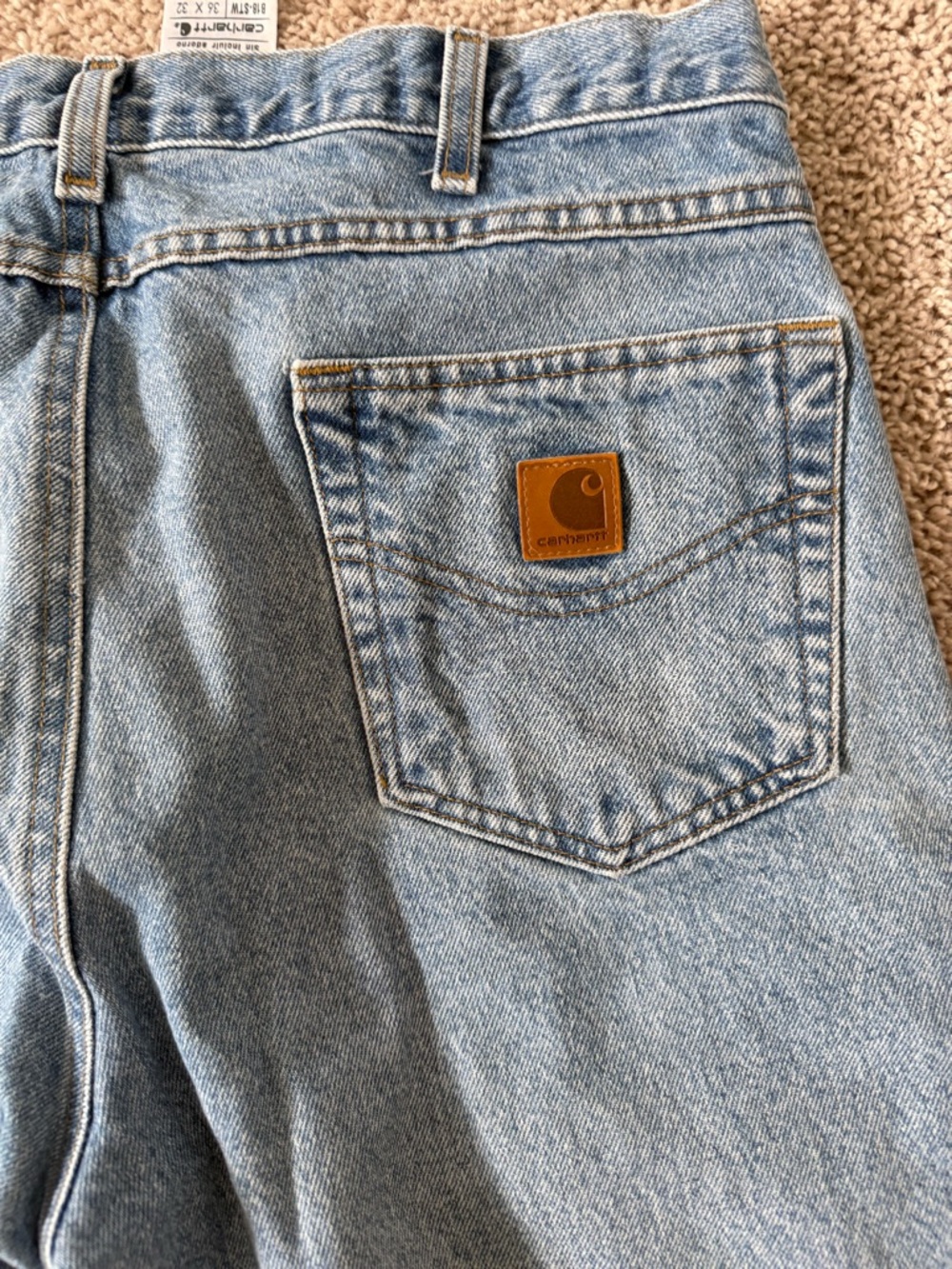 Carhartt Men's Light Wash Denim Jeans with Logo Patch